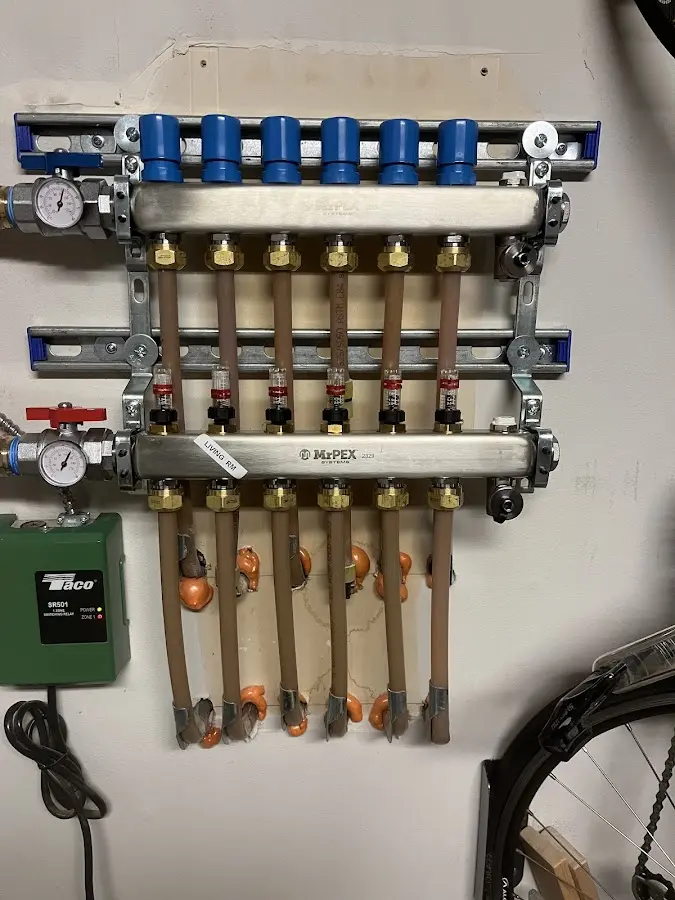 Plumber performing Water Heater Repair at a residential property in Fort Scott